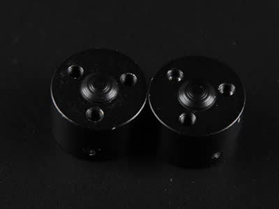 Two bottom of metal bubble level vials with three screw holes on the bottom.